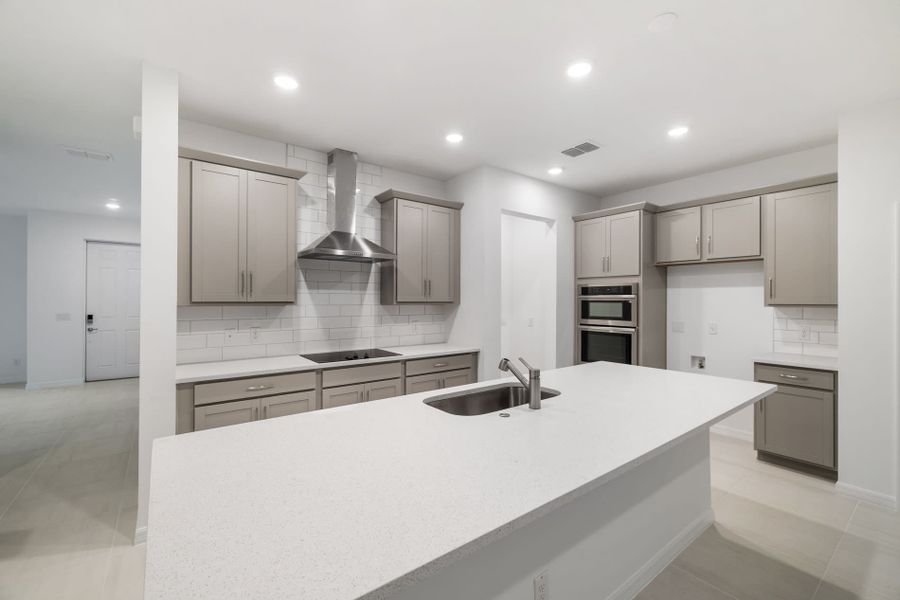 Furnished interior view inside a new home in Trinity Gardens, Deland (Image 7).