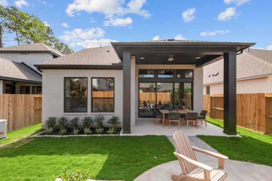 Exterior details and patio area of a home in The Highlands - Grove Collection, Porter (Image 3).