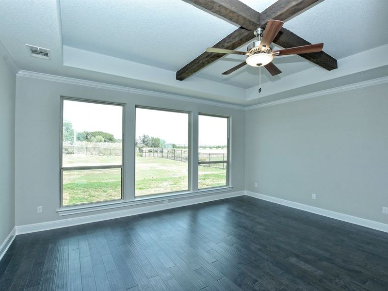 Representative unfurnished interior of a home built from the Madera II by Giddens Homes in Scofield Farms Estates, Georgetown (Image 332).