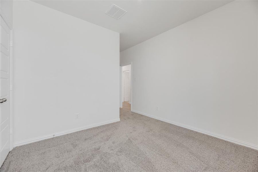 Spacious, unfurnished interior of a new home in Spiritas Ranch, Little Elm (Image 26). Spacious, unfurnished interior of a new home in Spiritas Ranch, Little Elm (Image 26).