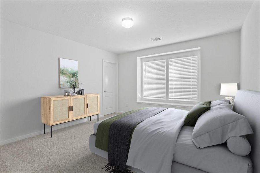 Secondary bedroom features plush carpet, neutral paint, lighting, large window with privacy blinds and ample sized closet space.