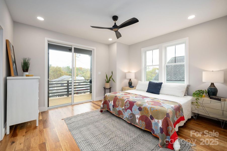 Primary Suite Features a Private Balcony and Ensuite Full Bathroom