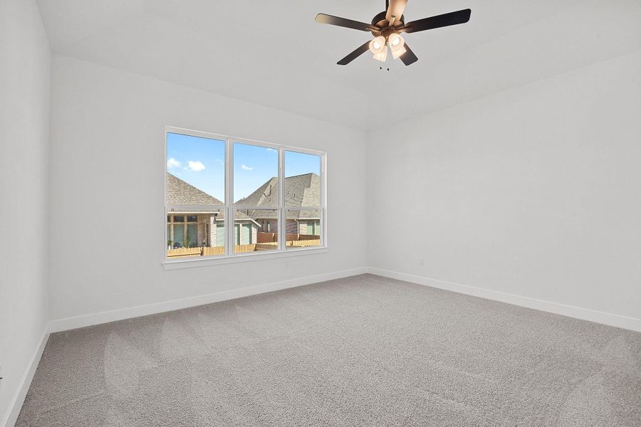 Spacious, unfurnished interior of a new home in The Colony, Bastrop (Image 34).