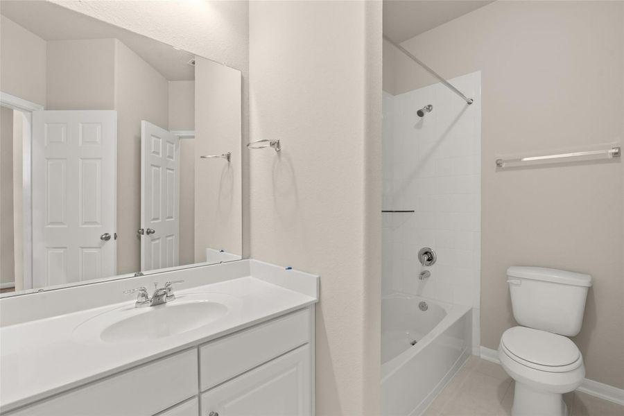 Furnished interior view inside a new home in Spring Creek Trails, Magnolia (Image 11).