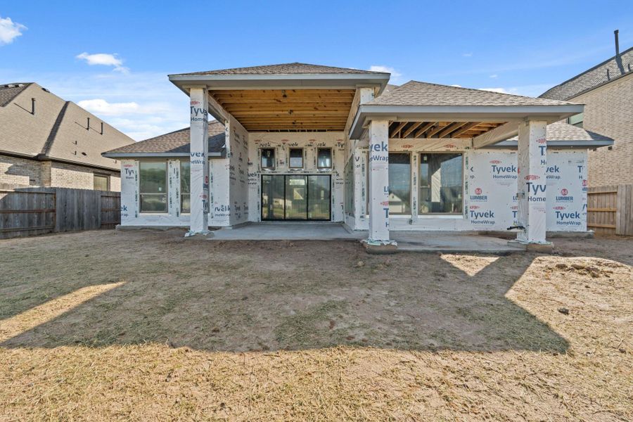 Exterior details and patio area of a home in The Park and The Reserve, Fulshear (Image 2).