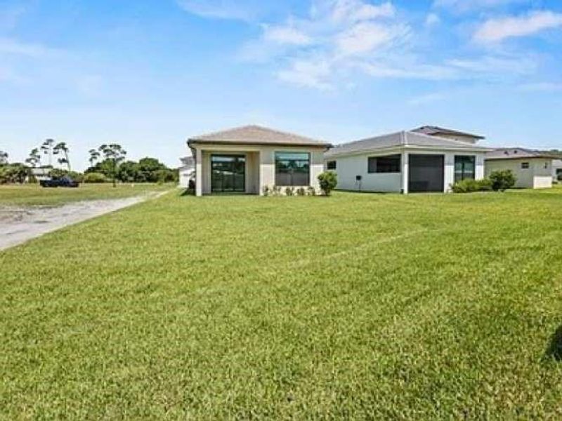 Exterior details and patio area of a home in , Port St. Lucie (Image 3).