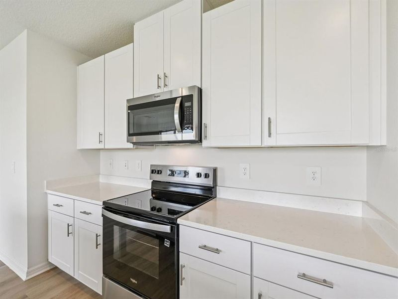 Furnished interior view inside a new home in Oakfield Trails - Signature Series, Parrish (Image 9).