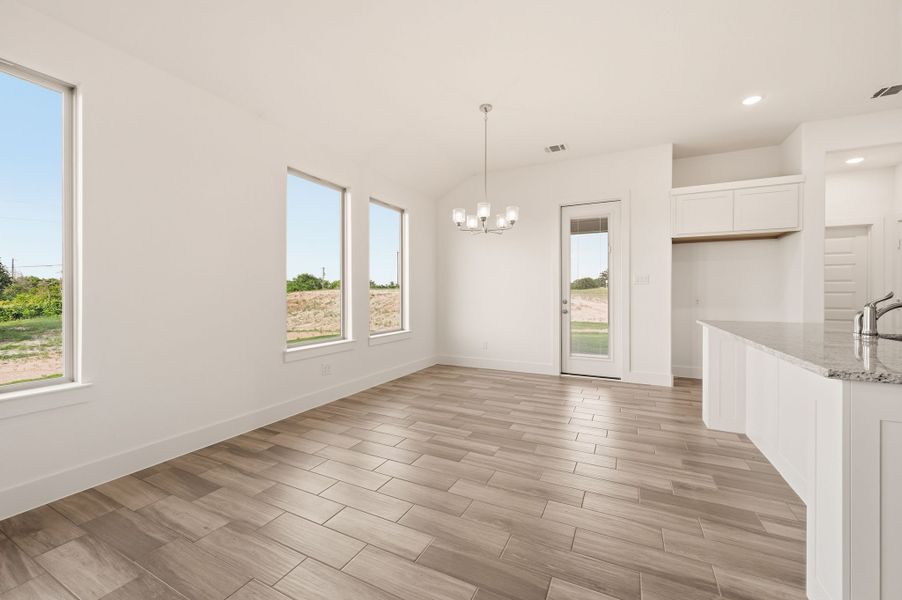 Spacious, unfurnished interior of a new home in Saddleback Estates, Boyd (Image 29).