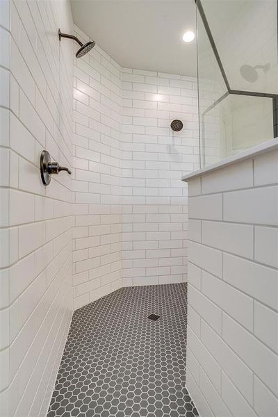 Bathroom with tiled shower