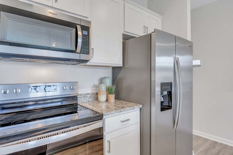 Representative furnished interior of a home built from the TUSCAN by D.R. Horton in Westbrook Retreat Villas at Savannah Quarters, Pooler (Image 10).