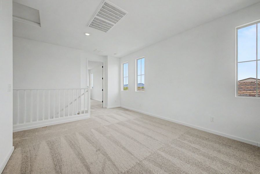 Spacious, unfurnished interior of a new home in Mason Ranch II, Surprise (Image 8).