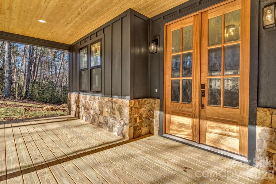 Exterior details and patio area of a home in , Mills River (Image 25).