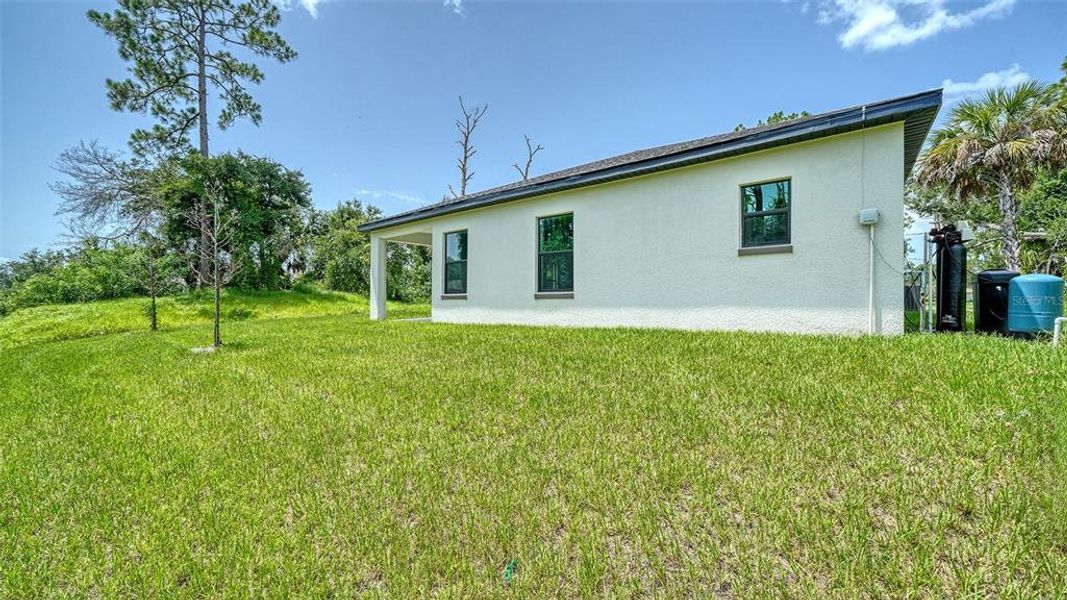 Exterior details and patio area of a home in , North Port (Image 3).