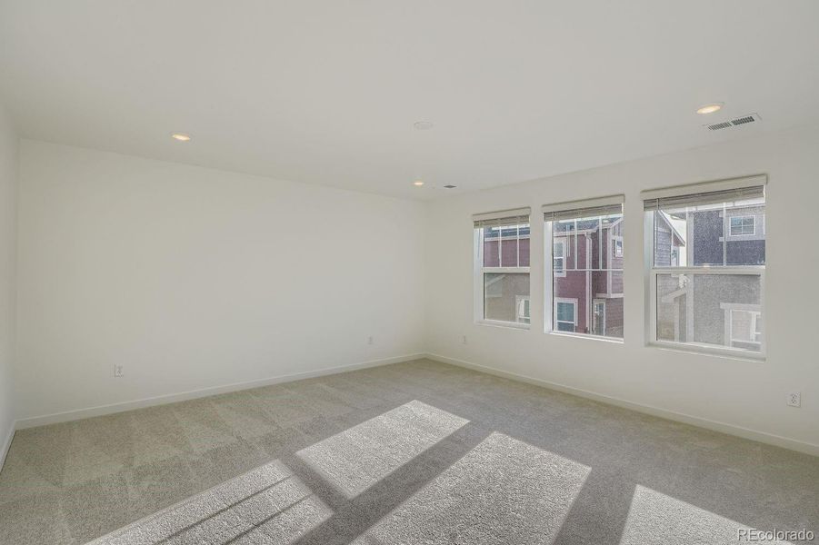 Spacious, unfurnished interior of a new home in Parterre: Paired Homes, Thornton (Image 12).