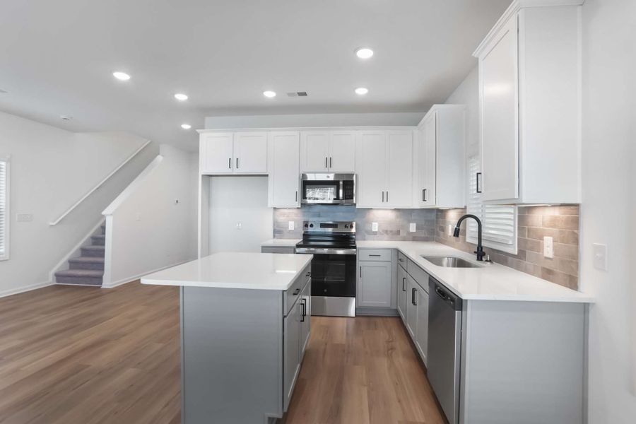 Representative furnished interior of a home built from the Khloe by KM Homes in The Cottages at Jackson Heights, Cleveland (Image 9).