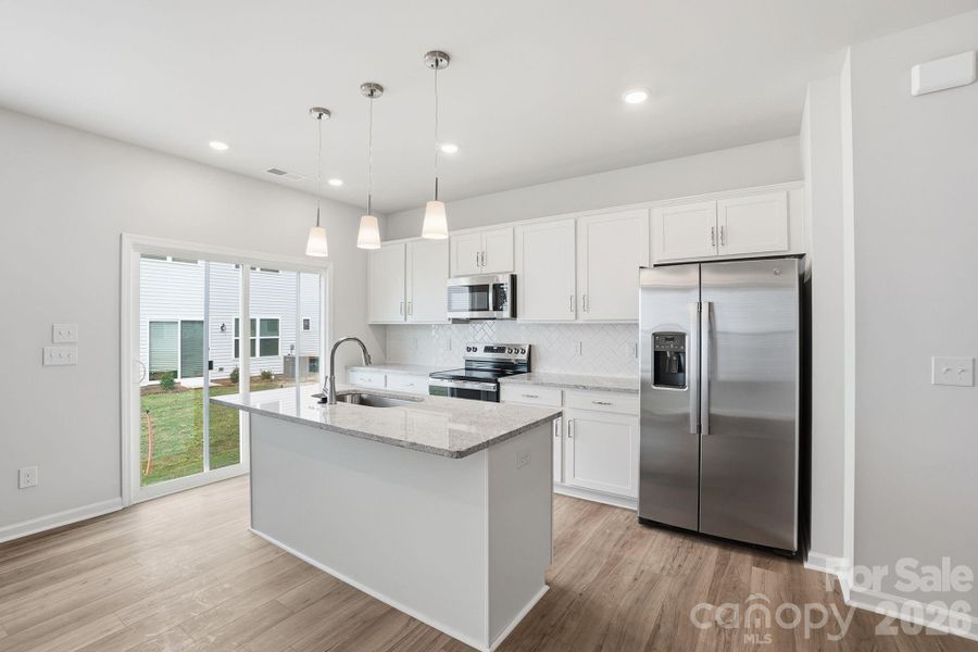 Furnished interior view inside a new home in Sloan Station, Charlotte (Image 4).