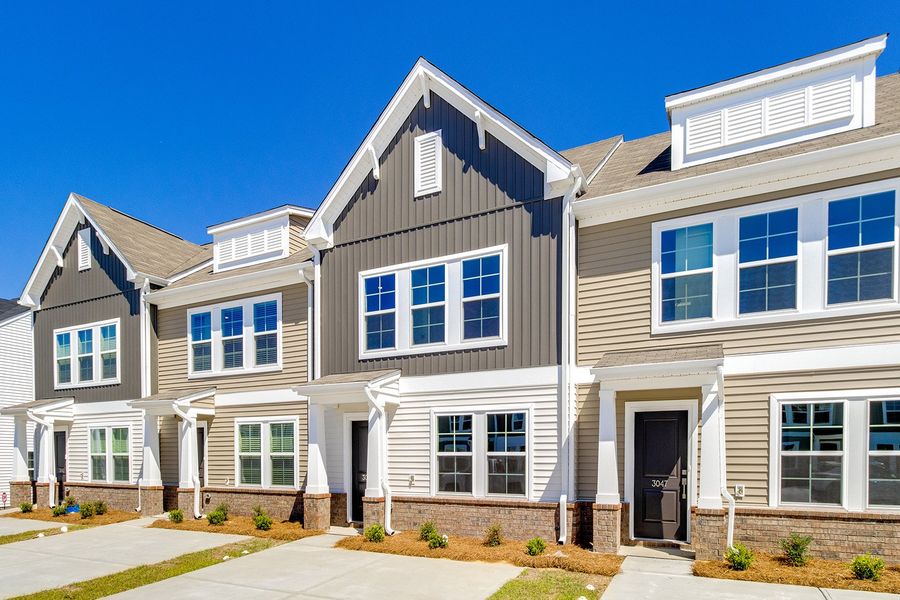 Front exterior of a new home in Astoria, Columbia, SC, highlighting curb appeal (Image 17).