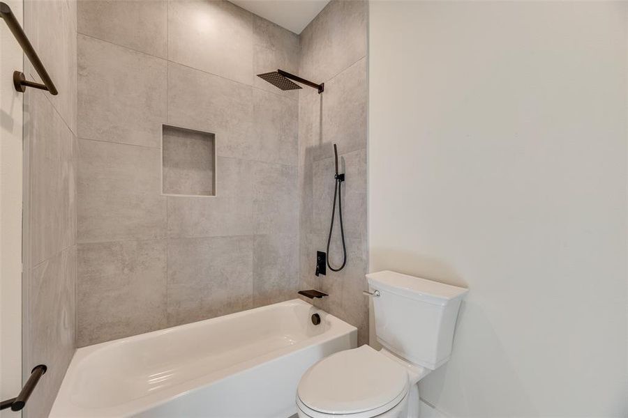 Full bath with shower combination and toilet Full bath with shower combination and toilet