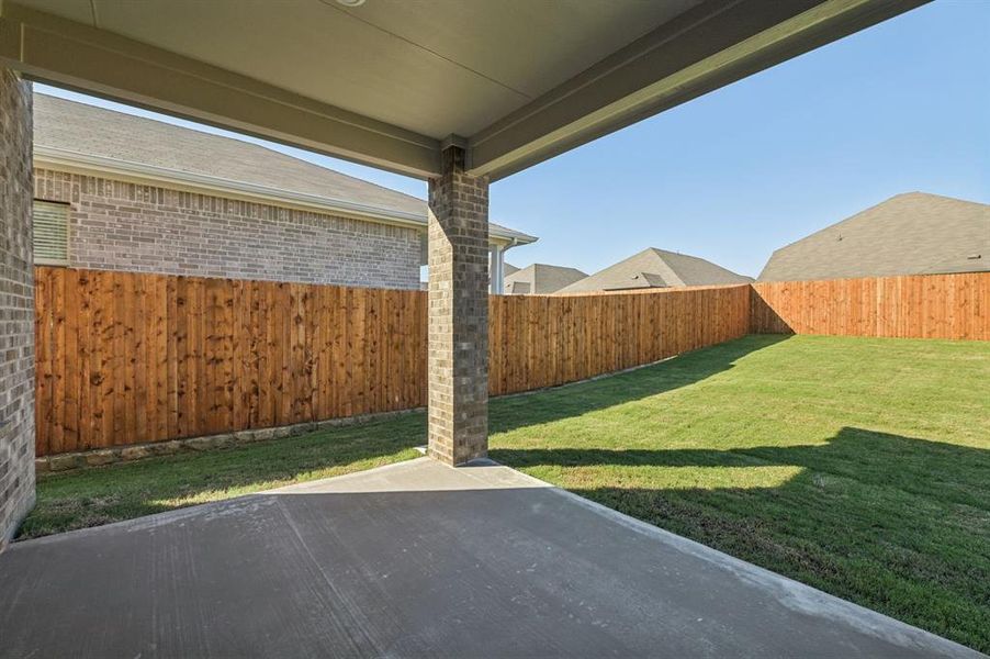 Exterior details and patio area of a home in Simpson Crossing - Spring Series, McKinney (Image 24).