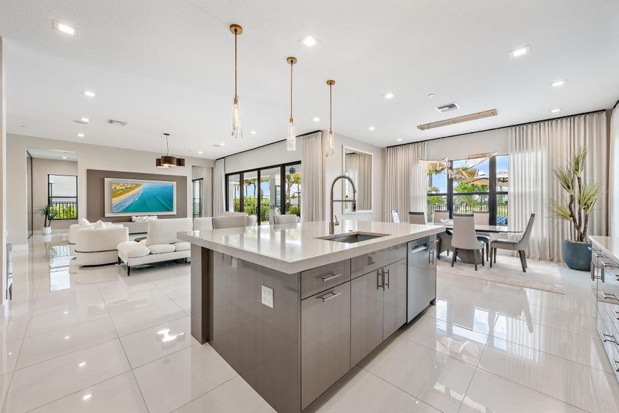 Fantastic open floorplan with easy access to the great room, home office, casual dining area, and pool from the kitchen.
