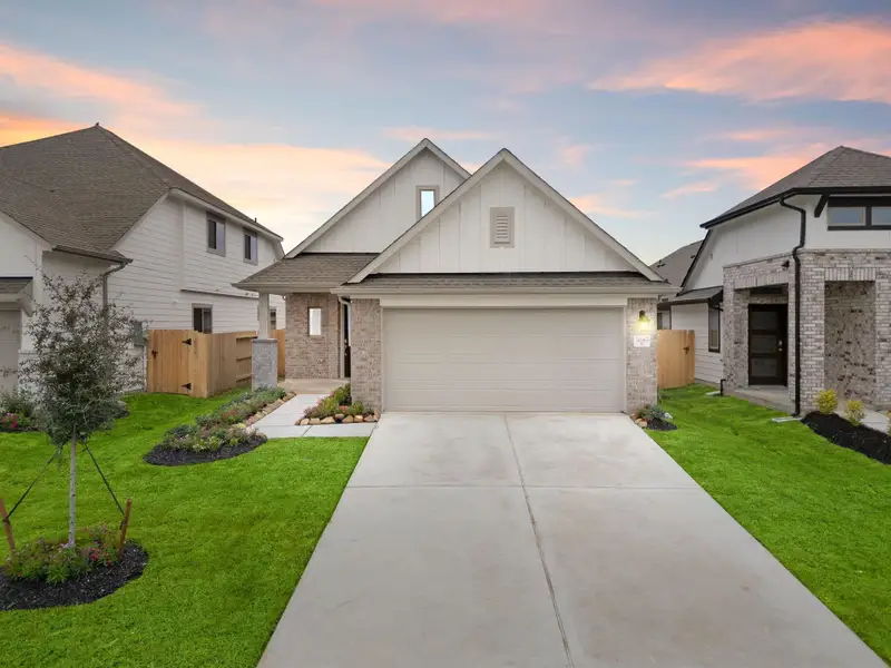 Front exterior of a new home in , Spring, TX, highlighting curb appeal (Image 1). Front exterior of a new home in , Spring, TX, highlighting curb appeal (Image 1).