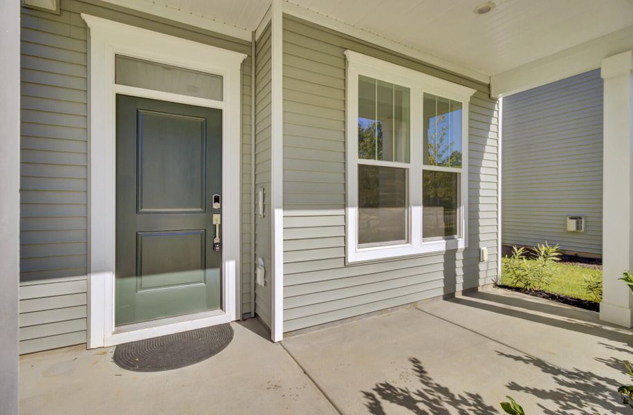 Exterior details and patio area of a home in Six Oaks, Summerville (Image 4).
