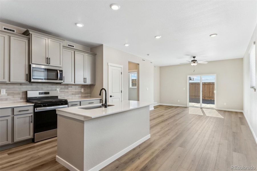 Furnished interior view inside a new home in Second Creek Farm, Commerce City (Image 9).