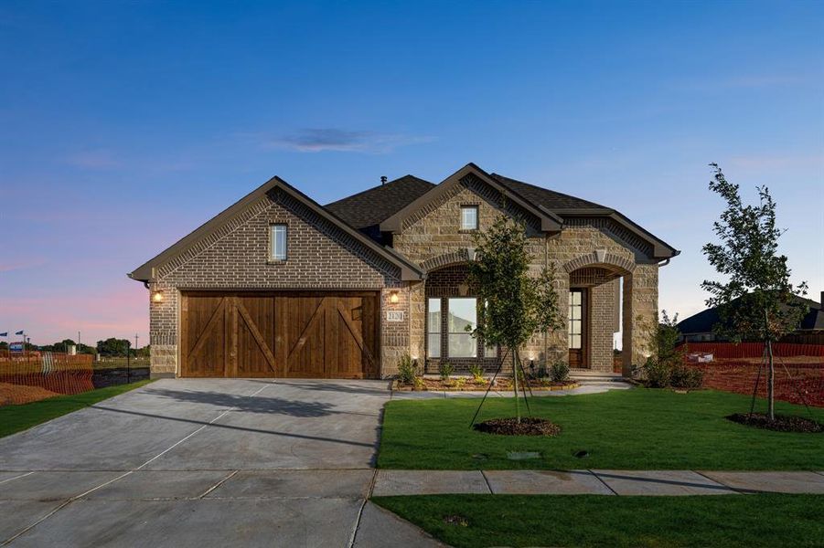 Front exterior of a new home in Stone River Glen 50s, Royse City, TX, highlighting curb appeal (Image 23).