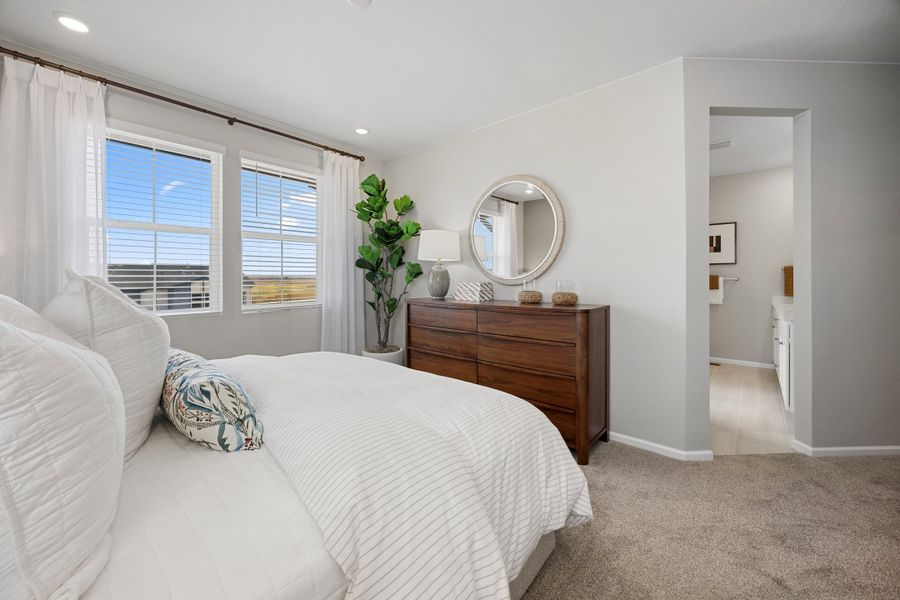Representative furnished interior of a home built from the 2504 by Risewell Homes in Harvest Crossing, Aurora (Image 15).