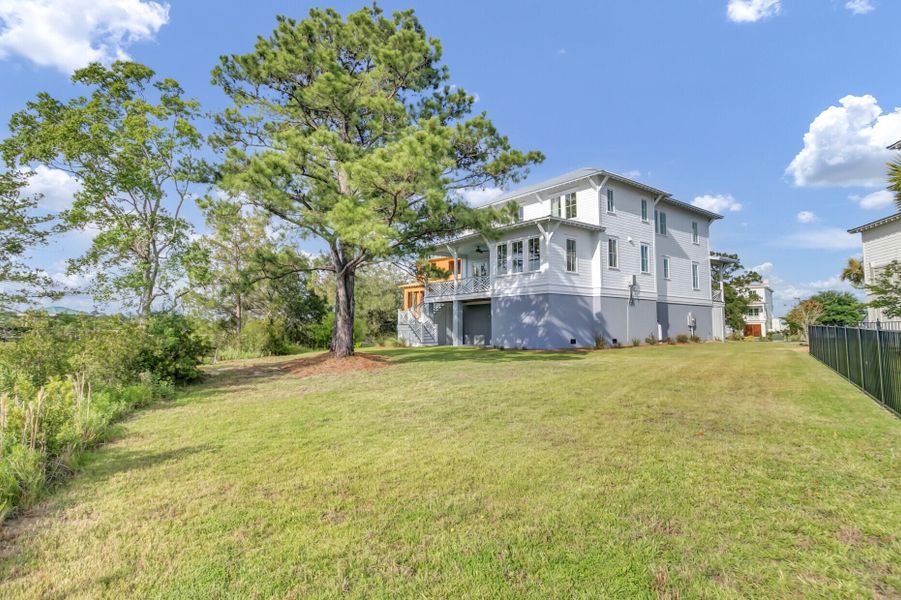 Exterior details and patio area of a home in , Johns Island (Image 31).