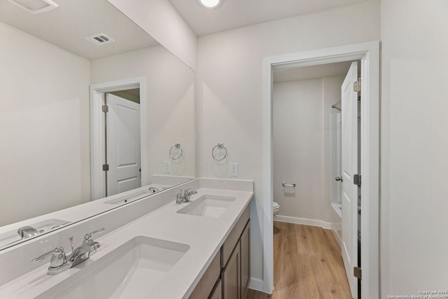 Furnished interior view inside a new home in , New Braunfels (Image 9).