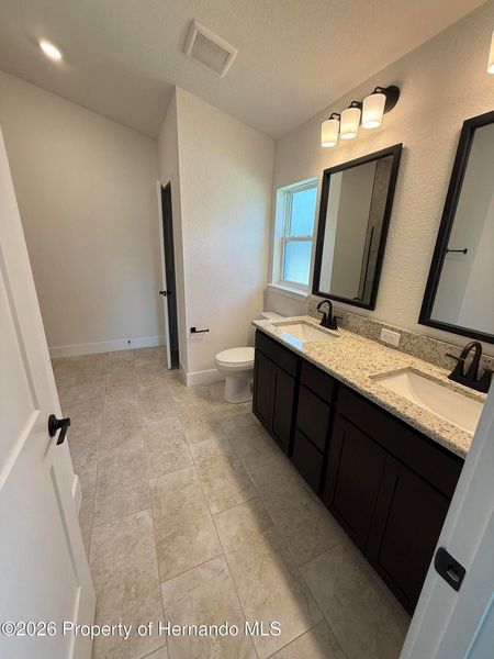 Furnished interior view inside a new home in Winding Oaks, Weeki Wachee (Image 5).