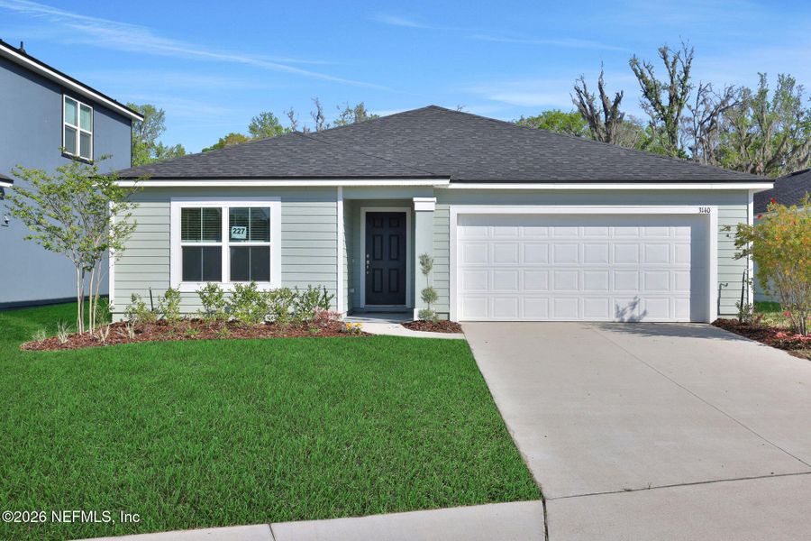Front exterior of a new home in Wilford Oaks, Orange Park, FL, highlighting curb appeal (Image 22).