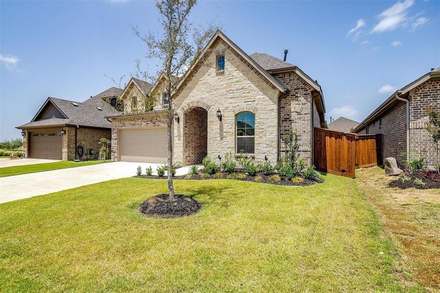 View of front of home with a front lawn