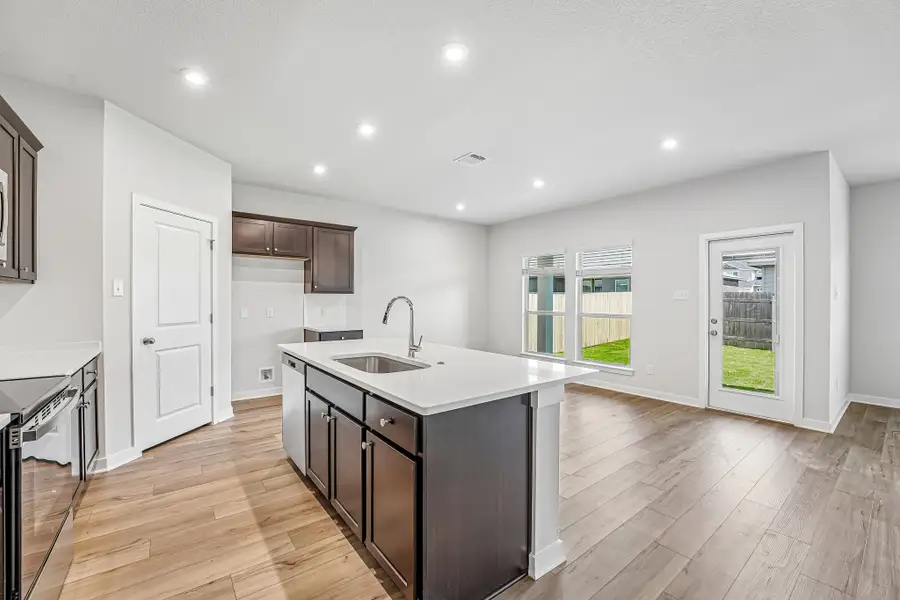 Representative furnished interior of a home built from the Warrior by Omega Builders in Grove East, Temple (Image 4).