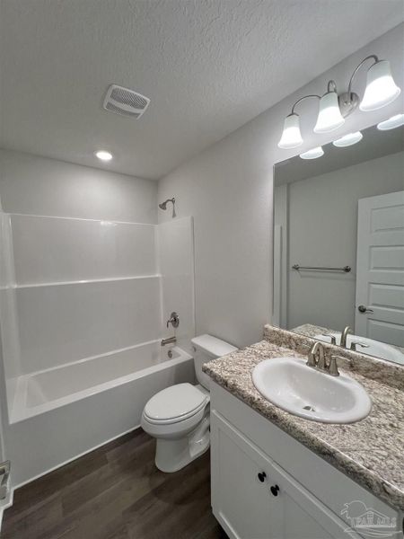 Furnished interior view inside a new home in Pine Top, Cantonment (Image 6).