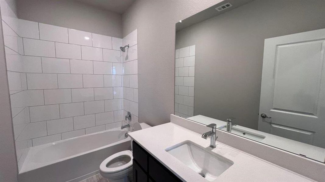 Furnished interior view inside a new home in Bluestem, Rhome (Image 6).