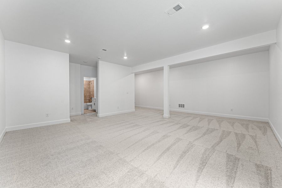 Representative unfurnished interior of a home built from the Bailey by Taylor Morrison in Dawson Trails Town Collection, Castle Rock (Image 9).