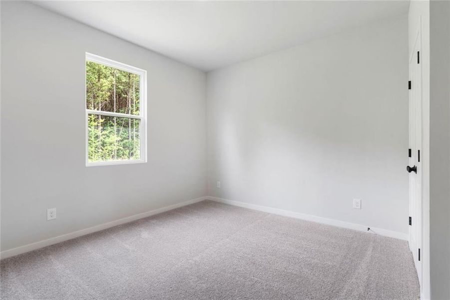 Spacious, unfurnished interior of a new home in Windsong Estates, McDonough (Image 12).