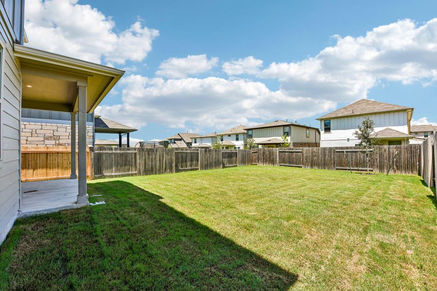 Exterior details and patio area of a home in Crosswinds, Kyle (Image 3).