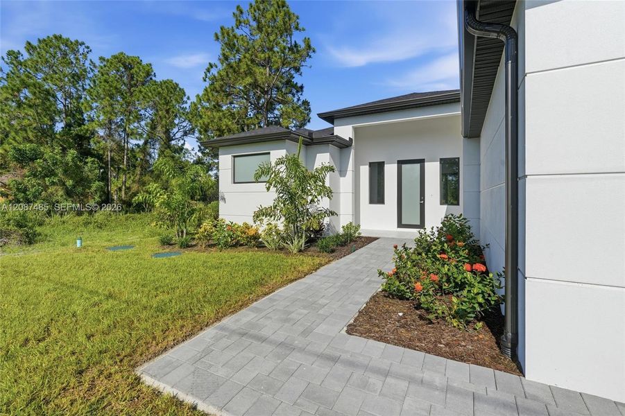 Exterior details and patio area of a home in , Lehigh Acres (Image 22). Exterior details and patio area of a home in , Lehigh Acres (Image 22).