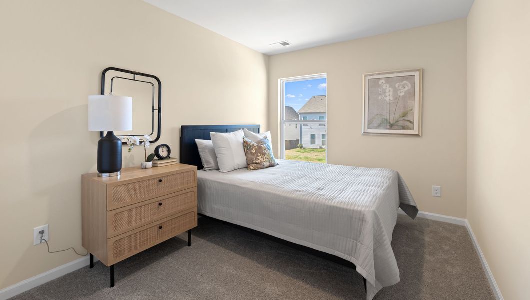 Furnished interior view inside a new home in Tanglewood Townes, Greenville (Image 16).