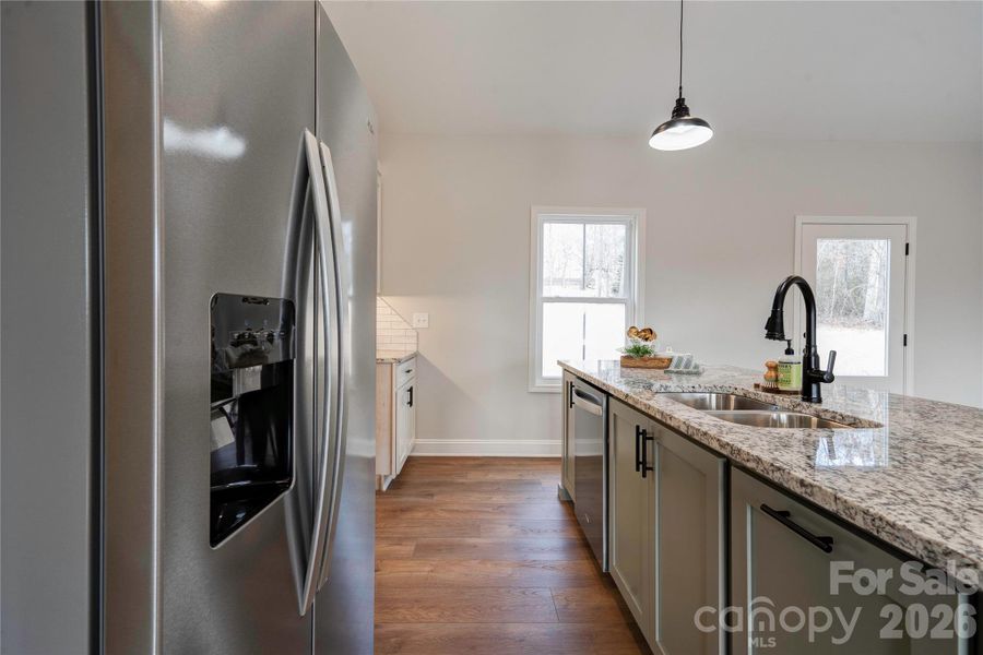 Kitchen has stainless appliances. Kitchen has stainless appliances.
