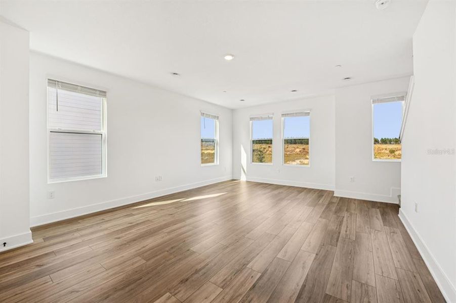 Spacious, unfurnished interior of a new home in Parkview at Hamlin, Winter Garden (Image 35).