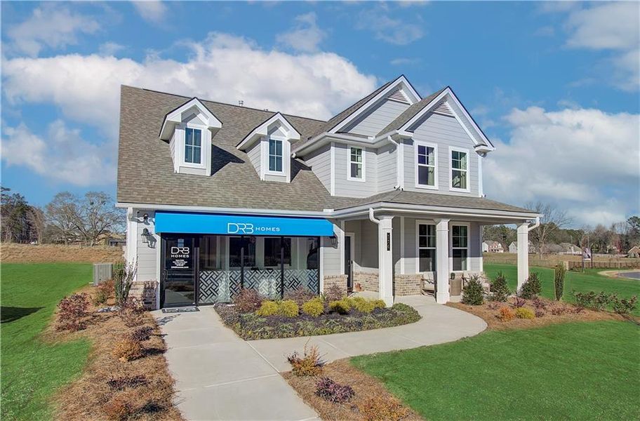 Front exterior of a new home in Cooper Park, McDonough, GA, highlighting curb appeal (Image 20). Front exterior of a new home in Cooper Park, McDonough, GA, highlighting curb appeal (Image 20).