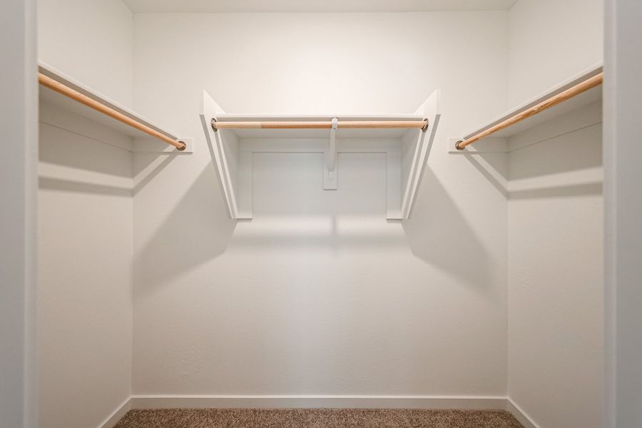 A white staircase with a railing.