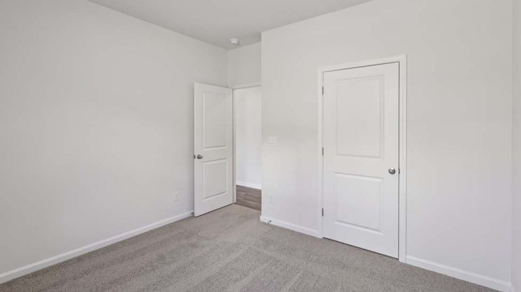 Spacious, unfurnished interior of a new home in Rydele Heights, Asheville (Image 33).