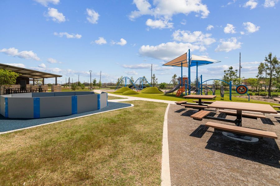 Front exterior of a new home in Sunterra, Katy, TX, highlighting curb appeal (Image 22). Front exterior of a new home in Sunterra, Katy, TX, highlighting curb appeal (Image 22).