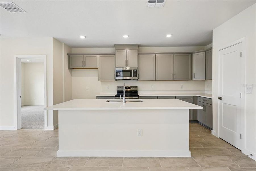 Furnished interior view inside a new home in Grasslands West, Lakeland (Image 16).
