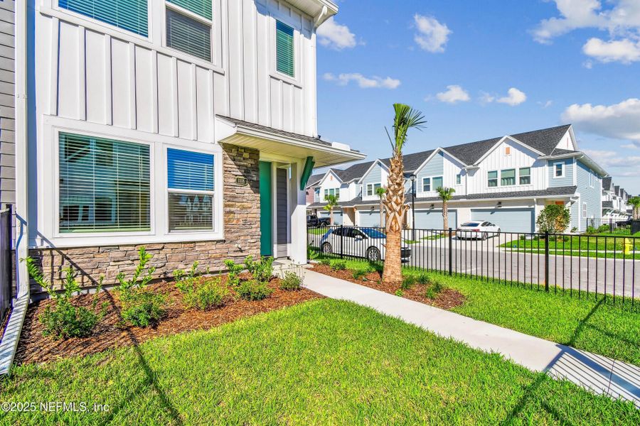 Exterior details and patio area of a home in Kettering at eTown - Garden Collection, Jacksonville (Image 15). Exterior details and patio area of a home in Kettering at eTown - Garden Collection, Jacksonville (Image 15).